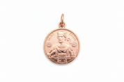 Médaille Saint Eloi en or rose sur fond blanc